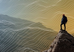 Hiker stands on a rocky peak overlooking a valley with abstract contour lines across the scene.
